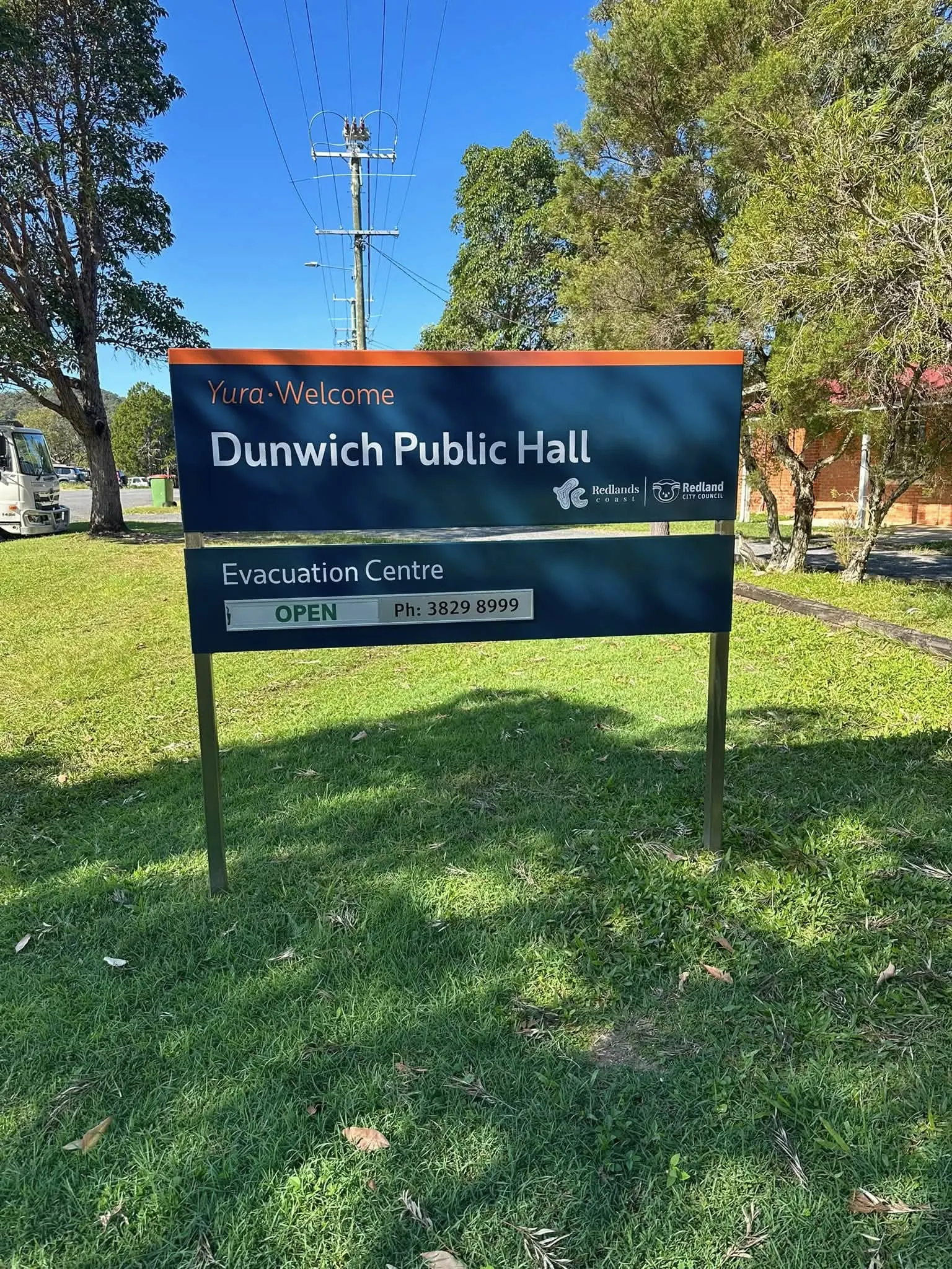 Dunwich Public Hall sign with evacuation centre notice