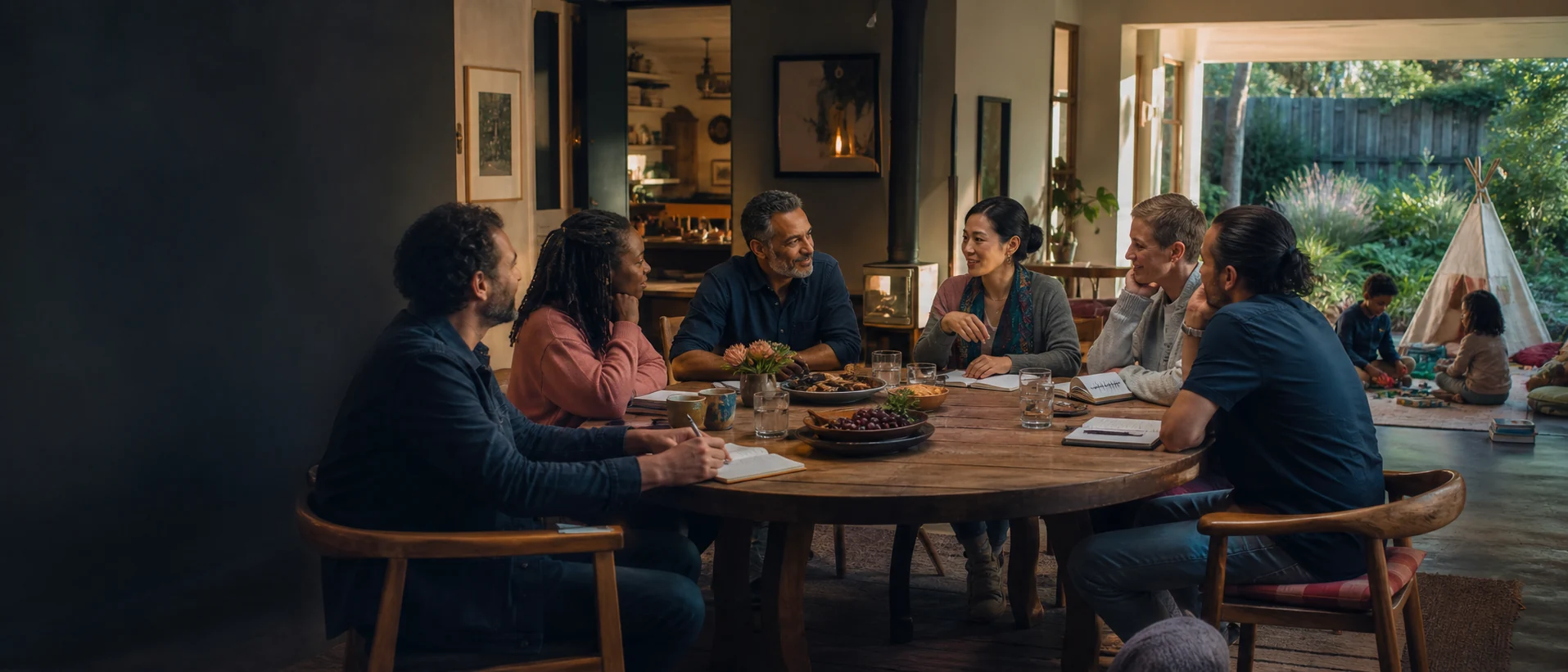 Concept artwork of adults at an open round table, each warmly lit and connected without hierarchy.
