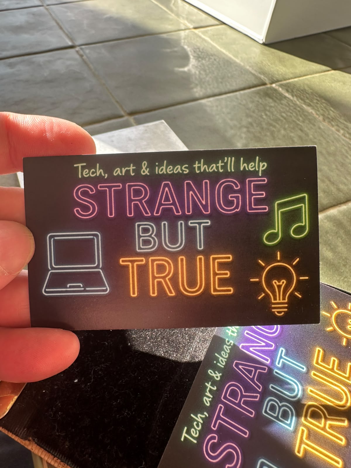 Strange but True business card