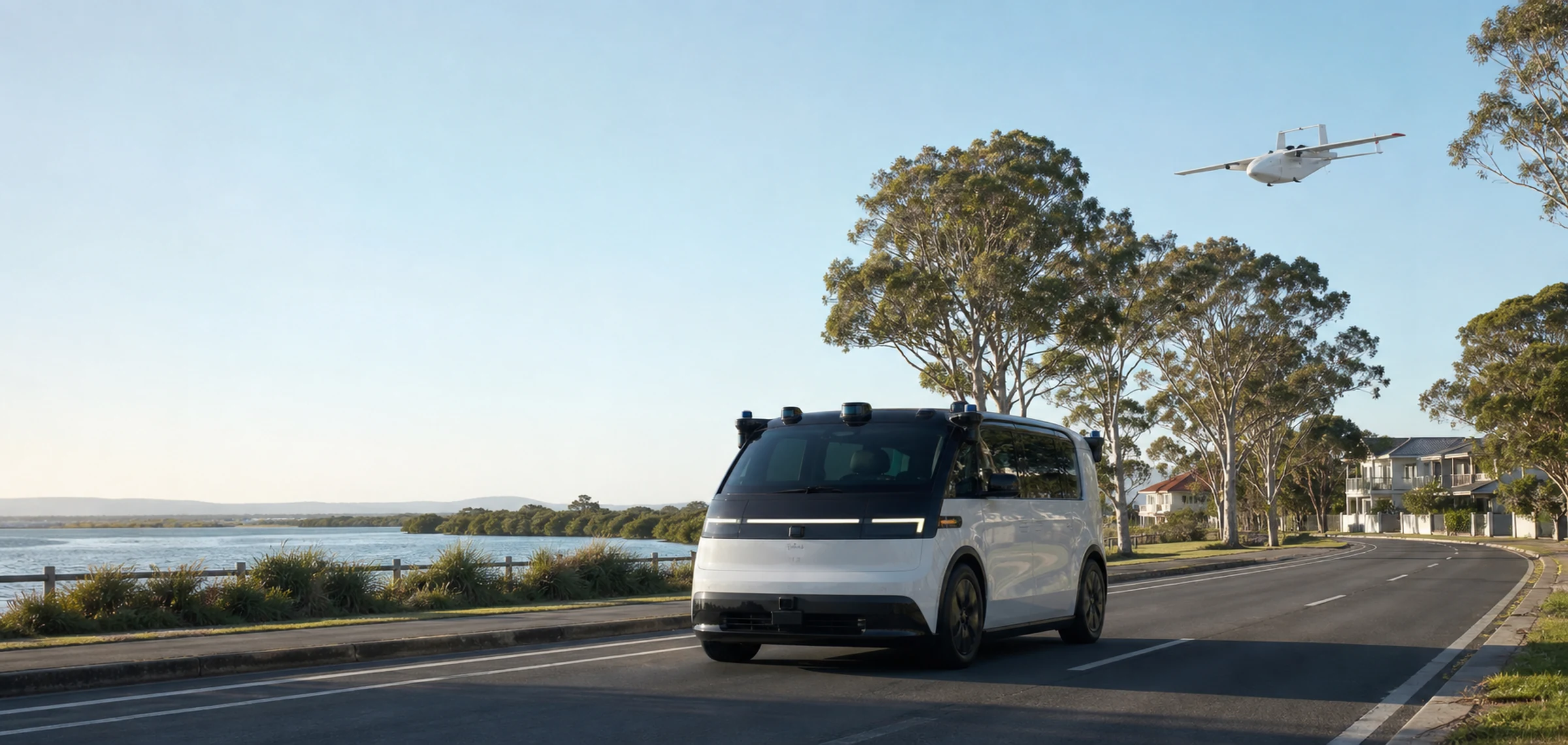An autonomous passenger vehicle and delivery aircraft moving through a Moreton Bay coastal neighbourhood